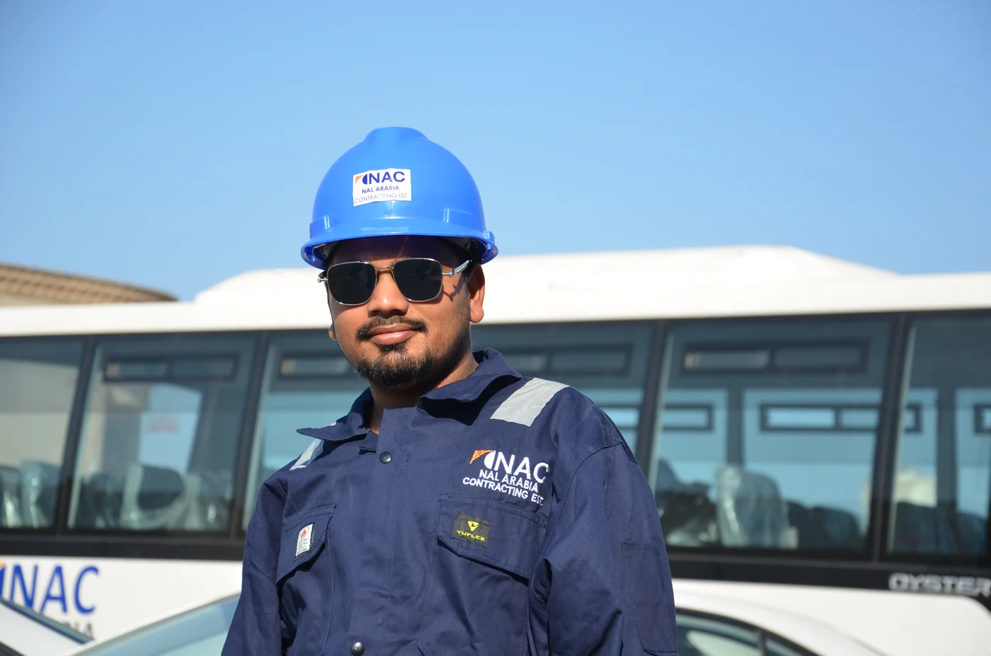 NAL Arabia worker in branded safety gear